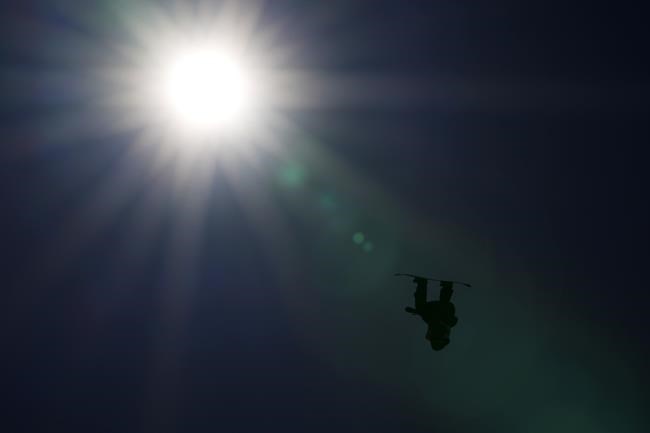 Canada's Mark McMorris competes during the men's slopestyle qualifying at the 2022 Winter Olympics, Sunday, Feb. 6, 2022, in Zhangjiakou, China. (AP Photo/Francisco Seco)