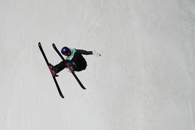 Eileen Gu of China competes during the women's freestyle skiing Big Air qualification round of the 2022 Winter Olympics, Monday, Feb. 7, 2022, in Beijing. (AP Photo/Jae C. Hong)