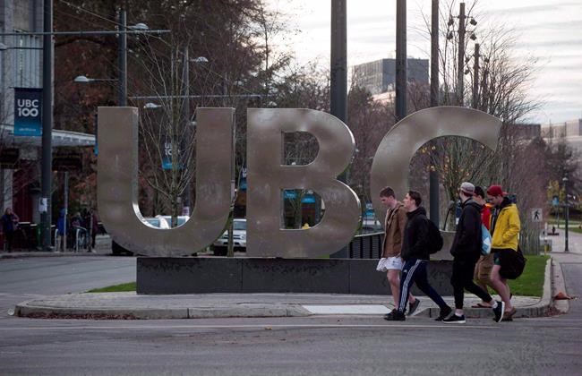 People walk past large letters spelling out UBC at the University of British Columbia in Vancouver, on November 22, 2015. Nearly 80 per cent of job openings in British Columbia over the next decade will require some level of post-secondary education, reflecting the changing nature of the economy emphasizing the importance of higher skills. THE CANADIAN PRESS/Darryl Dyck