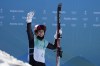 Eileen Gu, of China, reacts after winning the women's freestyle skiing big air finals of the 2022 Winter Olympics, Tuesday, Feb. 8, 2022, in Beijing. (AP Photo/Jae C. Hong)