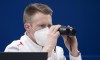 Canadian alternate Marc Kennedy keeps an eye on the action during mixed doubles curling play at the 2022 Winter Olympics in Beijing on Thursday, February 3, 2022. THE CANADIAN PRESS/Paul Chiasson