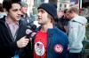 FILE - Snowboarding competitor Louie Vito is interviewed in Times Square during the U.S. Olympic Committee's Road to Sochi 100 Day Countdown event, Tuesday, Oct. 29, 2013, in New York. For years, Vito, who parlayed his halfpipe career into one of a part-time celebrity, has represented the red, white and blue of Team USA. For Beijing, he’s switching to the green, white, and red of Italy as he returns to the Olympic arena for the first time since taking fifth on the halfpipe in Vancouver in 2010. (AP Photo/John Minchillo, File)
