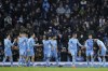 Manchester City's Riyad Mahrez, right, celebrates after scoring his side's fourth goal during an English FA Cup fourth round soccer match between Manchester City and Fulham at the Etihad Stadium in Manchester, England, Saturday, Feb. 5, 2022. (AP Photo/Jon Super)