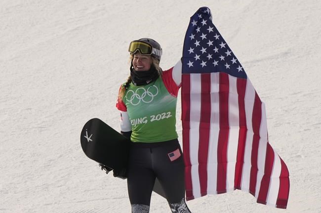 United States' Lindsey Jacobellis celebrates after winning a gold medal in the women's cross at the 2022 Winter Olympics, Wednesday, Feb. 9, 2022, in Zhangjiakou, China. (AP Photo/Francisco Seco)