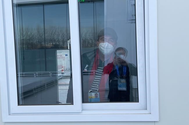 Associated Press reporter John Leicester is held in Isolation Room 2, where he was kept while being re-tested for COVID-19 after testing positive at the 2022 Winter Olympics, Saturday, Feb. 5, 2022, in Beijing. (AP Photo/Steve Moyes)