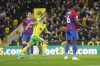 Norwich City's Teemu Pukki, center, celebrates scoring their side's first goal of the game during the English Premier League soccer match between Norwich City and Crystal Palace at Carrow Road, Norwich, England, Wednesday, Feb. 9, 2022. (Joe Giddens/PA via AP)
