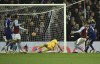 Leeds United's Diego Llorente, right, scores his side's third goal during the English Premier League soccer match between Aston Villa and Leeds United at Villa Park in Birmingham, England, Wednesday, Feb. 9, 2022. (AP Photo/Rui Vieira)