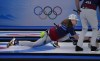 United States' Matt Hamilton, throws a rock, during the men's curling match against the Russian Olympic Committee, at the 2022 Winter Olympics, Wednesday, Feb. 9, 2022, in Beijing. (AP Photo/Nariman El-Mofty)