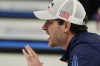 United States' John Shuster yells to a sweeper during a men's curling match against Sweden at the Beijing Winter Olympics Thursday, Feb. 10, 2022, in Beijing. (AP Photo/Brynn Anderson)