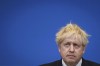 Britain's Prime Minister Boris Johnson pauses, during a joint press conference with NATO Secretary General Jens Stoltenberg, following a meeting at the NATO headquarters, in Brussels, Belgium, Thursday, Feb. 10, 2022. Johnson hasn't been able to escape his domestic woes during a trip to Belgium and Poland aimed at increasing pressure on Russia over its troop buildup near Ukraine. Johnson was trying show NATO’s resolve in response to Russia massing troops near its neighbor’s borders. But he faced questions about a police investigation into lockdown-breaching government parties that has shaken his grip on power. (Daniel Leal/Pool via AP)