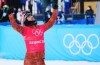 Canada's Eliot Grondin celebrates his silver medal in the men's snowboard cross final at the 2022 Beijing Winter Olympics in Zhangjiakou, China on Thursday, February 10, 2022. THE CANADIAN PRESS/Sean Kilpatrick