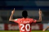 Canada's Jonathan David celebrates scoring his side's 2nd goal against El Salvador during a qualifying soccer match for the FIFA World Cup Qatar 2022 at Cuscatlan stadium in San Salvador, El Salvador, Wednesday, Feb. 2, 2022. THE CANADIAN PRESS/AP/Moises Castillo