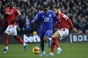 Nottingham Forest's Philip Zinckernagel, right, tries to tackle Leicester's Ademola Lookman during the English FA Cup fourth round soccer match between Nottingham Forest and Leicester City at the City Ground, Nottingham, England, Sunday, Feb. 6, 2022. (AP Photo/Rui Vieira)