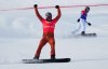 Canada's Eliot Grondin celebrates after crossing the finish line in the men's snowboard cross semifinals at the 2022 Beijing Winter Olympics in Zhangjiakou, China on Thursday, February 10, 2022. THE CANADIAN PRESS/Sean Kilpatrick