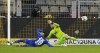 Leverkusen's Moussa Diaby scores his side's 5th goal against Dortmund's goalkeeper Gregor Kobel during the German Bundesliga soccer match between Borussia Dortmund and Bayer Leverkusen in Dortmund, Germany, Sunday, Feb. 6, 2022. (AP Photo/Martin Meissner)