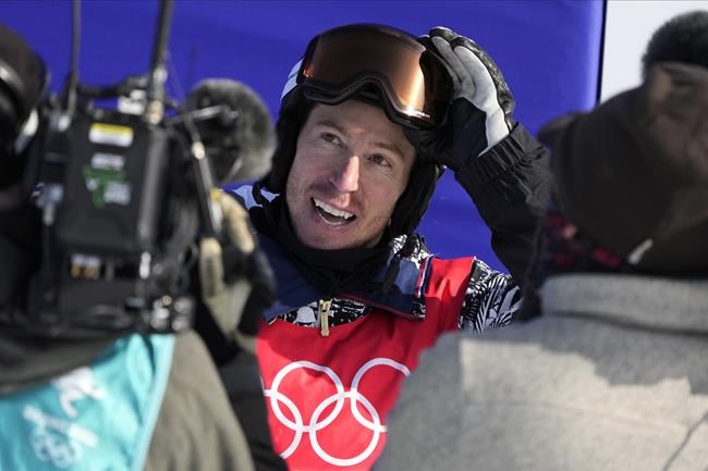 United States' Shaun Whitecompetes during the men's halfpipe finals at the 2022 Winter Olympics, Friday, Feb. 11, 2022, in Zhangjiakou, China. (AP Photo/Lee Jin-man)