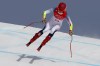 Mikaela Shiffrin, of United States makes a jump during the women's super-G at the 2022 Winter Olympics, Friday, Feb. 11, 2022, in the Yanqing district of Beijing. (AP Photo/Alessandro Trovati)