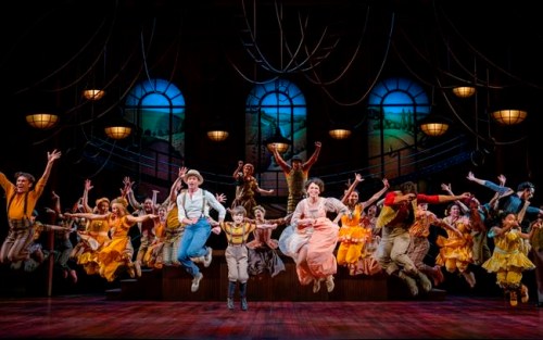 Hugh Jackman, center left, and Sutton Foster, center right, appear during a performance of 