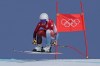Lara Gut-Behrami, of Switzerland makes a jump during the women's super-G at the 2022 Winter Olympics, Friday, Feb. 11, 2022, in the Yanqing district of Beijing. (AP Photo/Robert F. Bukaty)