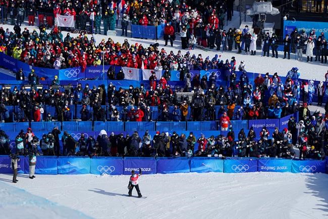 United States' Shaun White waves after competing in the men's halfpipe finals at the 2022 Winter Olympics, Friday, Feb. 11, 2022, in Zhangjiakou, China. (AP Photo/Gregory Bull)