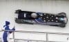 Hunter Church of the United States drives his 2-man bobsled during a training heat at the 2022 Winter Olympics, Friday, Feb. 11, 2022, in the Yanqing district of Beijing. (AP Photo/Dmitri Lovetsky)