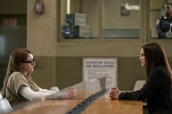This image released by Netflix shows Julia Garner, left, and Anna Chlumsky in a scene from 