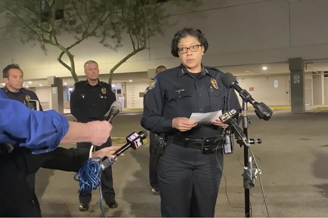 In this image taken from video provided by the Phoenix Police Department, Police Chief Jeri Williams provides an update on several officers that were shot outside a hospital in Phoenix, Friday, Feb. 11, 2022. Five Phoenix police officers were shot in an ambush after responding to a report of gunfire inside a home early Friday, including four who were wounded while trying to take a baby to safety, police said. Four more officers were injured by shrapnel or ricocheting bullets. (Phoenix Police Department via AP)