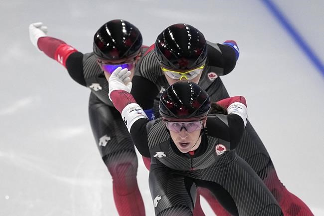 Canada's Ivanie Blondin, front to back, Isabelle Weidemann and Valerie Maltais, compete in the speedskating women's team pursuit quarterfinals at the 2022 Winter Olympics, in Beijing, Saturday, Feb. 12, 2022. The trio advanced to the semifinals of the women's team pursuit Saturday at the Beijing Olympics. THE CANADIAN PRESS/AP-Sue Ogrocki