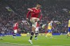 Manchester United's Cristiano Ronaldo reacts after missing a chance during the English Premier League soccer match between Manchester United and Southampton at Old Trafford stadium in Manchester, England, Saturday, Feb. 12, 2022. (AP Photo/Jon Super)
