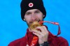 Canada's Max Parrot celebrates with his gold medal during the medal ceremony for men's snowboard slopestyle at the Beijing Winter Olympics in Zhangjiakou, China, on Monday, Feb. 7, 2022.The 27-year-old will chase a second Tuesday in big air. THE CANADIAN PRESS/Sean Kilpatrick