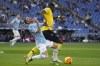 Lazio's Mattia Zaccagni, left, is fouled by Bologna's Adama Soumaoro during the Italian Series A soccer match between Lazio and Bologna at Rome's Olympic stadium, Saturday, Feb. 12, 2022. (AP Photo/Gregorio Borgia)