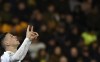 Manchester City's Phil Foden celebrates after scoring his side's second goal during the English Premier League soccer match between Norwich City and Manchester City at Carrow Road Stadium in Norwich, England, Saturday, Feb. 12, 2022. (AP Photo/Rui Vieira)