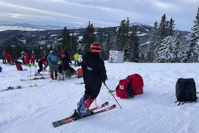 In this photo provided by Charles Lee, his daughter Maggie Lee, of Taiwan, waits at the start of a ski competition held in Austria on Jan. 6, 2022. The four Taiwanese athletes competing in Beijing for the Winter Olympics, which open Friday, Feb. 4, 2022, can’t use Taiwan’s flag and have long competed under a name, Chinese Taipei. “When I’m meeting people, I’ll them I’m from Taiwan, because, if you tell people you’re from Chinese Taipei, nobody knows where you’re from, you can’t find it on Google,” she said. (Charles Lee via AP)