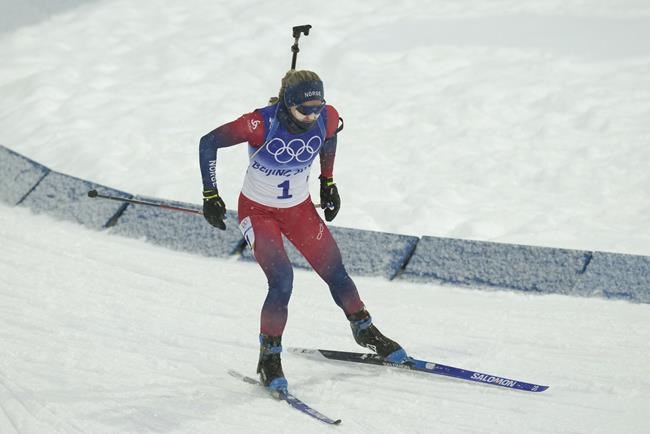 Marte Olsbu Roeiseland of Norway skis during the women's 10-kilometer pursuit race at the 2022 Winter Olympics, Sunday, Feb. 13, 2022, in Zhangjiakou, China. (AP Photo/Kirsty Wigglesworth)