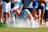 Scottie Scheffler hits out of a green side bunker at the third hole during the final round of the Phoenix Open golf tournament Sunday, Feb. 13, 2022, in Scottsdale, Ariz. (AP Photo/Ross D. Franklin)