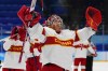 China goalkeeper Jieruimi Shimisi (Jeremy Smith) waves to fans as the team leaves the ice after a preliminary round men's hockey game against Germany at the 2022 Winter Olympics, Saturday, Feb. 12, 2022, in Beijing. (AP Photo/Matt Slocum)