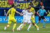 Real Madrid's Eden Hazard, center, vies for the ball with Villarreal's Pau Torres during a Spanish La Liga soccer match between Villarreal and Real Madrid at the Ceramica stadium in Villarreal, Spain, Saturday, Feb. 12, 2022. (AP Photo/Alberto Saiz)