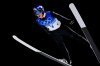 Ryoyu Kobayashi, of Japan, soars through the air during a men's team ski jumping trial round for competition at the 2022 Winter Olympics, Monday, Feb. 14, 2022, in Zhangjiakou, China. (AP Photo/Andrew Medichini)