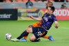 Houston Dynamo midfielder Fafa Picault, back, attempts a shot on goal as Seattle Sounders defender Shane O'Neill (27) blocks the kick during the first half of an MLS soccer match Saturday, Oct. 16, 2021, in Houston. THE CANADIAN PRESS/AP/Michael Wyke