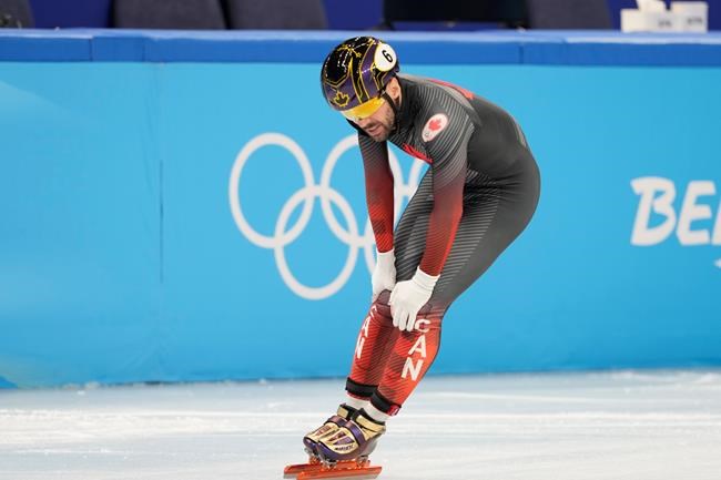 Canada's Charles Hamelin skates away after the men's 1,500-metre short-track speedskating semifinal at the Beijing Winter Olympics in Beijing, China, on Wednesday, Feb. 9, 2022. THE CANADIAN PRESS/Paul Chiasson