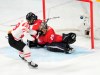Canada forward Marie-Philip Poulin (29) scores on Switzerland goaltender Saskia Maurer during second period women's ice hockey semifinals action Monday, February 14, 2022 at the 2022 Winter Olympics in Beijing. THE CANADIAN PRESS/Ryan Remiorz