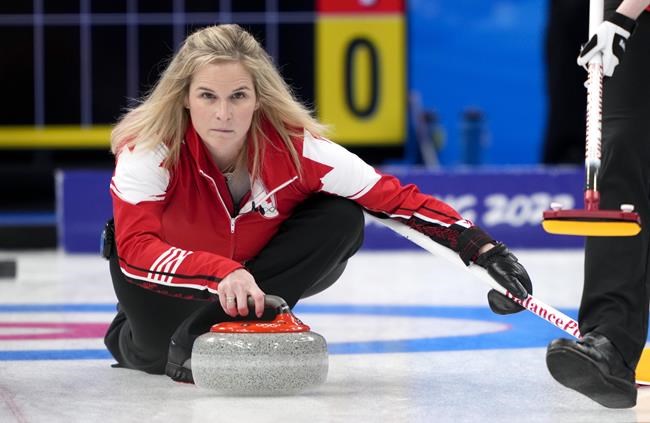 Canadian skip Jennifer Jones delivers a shot as they face the team from the Russian Olympic Committee at the 2022 Winter Olympics in Beijing on Monday, February 14, 2022. THE CANADIAN PRESS/Paul Chiasson