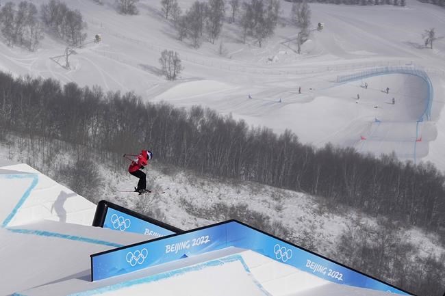 China's Eileen Gu competes during the women's slopestyle finals at the 2022 Winter Olympics, Tuesday, Feb. 15, 2022, in Zhangjiakou, China. (AP Photo/Gregory Bull)