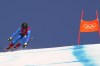 Sofia Goggia, of Italy makes a jump during the women's downhill at the 2022 Winter Olympics, Tuesday, Feb. 15, 2022, in the Yanqing district of Beijing. (AP Photo/Robert F. Bukaty)