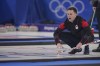 Canada's Brad Gushue yells to his teammates during a men's curling match against China at the Beijing Winter Olympics Tuesday, Feb. 15, 2022, in Beijing. THE CANADIAN PRESS/AP/Brynn Anderson