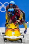 Francesco Friedrich and Thorsten Margis, of Germany, start the 2-man heat 3 at the 2022 Winter Olympics, Tuesday, Feb. 15, 2022, in the Yanqing district of Beijing. (AP Photo/Dmitri Lovetsky)
