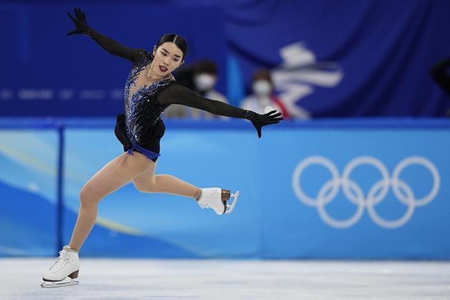 Karen Chen, of the United States, competes in the women's short program during the figure skating at the 2022 Winter Olympics, Tuesday, Feb. 15, 2022, in Beijing. (AP Photo/David J. Phillip)