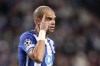 FILE - Porto's Pepe rubs his head during their Champions League Group B soccer match against Atletico Madrid at the Dragao stadium in Porto, Portugal, Tuesday, Dec. 7, 2021. Porto defender Pepe has been suspended for two matches after being accused of kicking an official from another team during a brawl in the Portuguese league last week. The veteran Portugal international was red carded for allegedly kicking a Sporting Lisbon club director during the altercation at the end of the 2-2 draw between the teams on Friday, Feb. 11, 2022. (AP Photo/Luis Vieira, file)