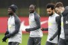 Liverpool's Sadio Mane, center, and teammates attend a training session ahead of Wednesday's Champions League soccer match against Inter Milan, at the AXA Training Centre, Liverpool, England, Tuesday, Feb. 15, 2022. (Martin Rickett/PA via AP)
