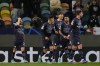Manchester City players celebrate their fourth goal during the Champions League round of 16 soccer match between Sporting CP and Manchester City at the Alvalade stadium in Lisbon, Portugal, Tuesday, Feb. 15, 2022. (AP Photo/Armando Franca)